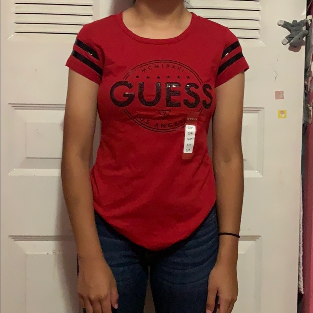 red and black guess shirt